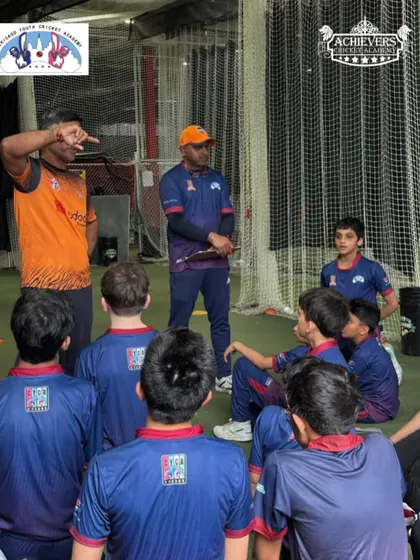 Coach Ashok Kadam making a point to young players at the CYCA trials. Our mentorship goes beyond drills; we teach the strategic aspects of the game.