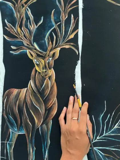 The majestic hand-painted deer on a black velvet tuxedo. This piece was inspired by the grace and power of wildlife, and I worked to capture that spirit in the artwork.