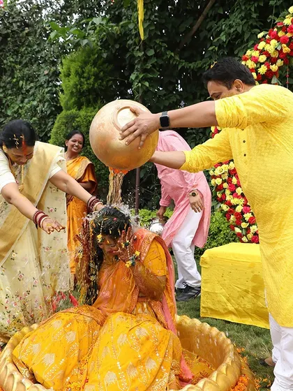Another joyful moment from a Haldi ceremony, capturing the essence of this fun-filled tradition.