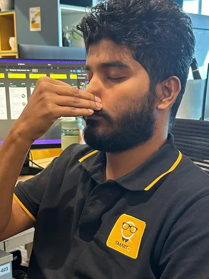 A close-up of an employee practicing a pranayama technique, showcasing the focus and calm these exercises bring.