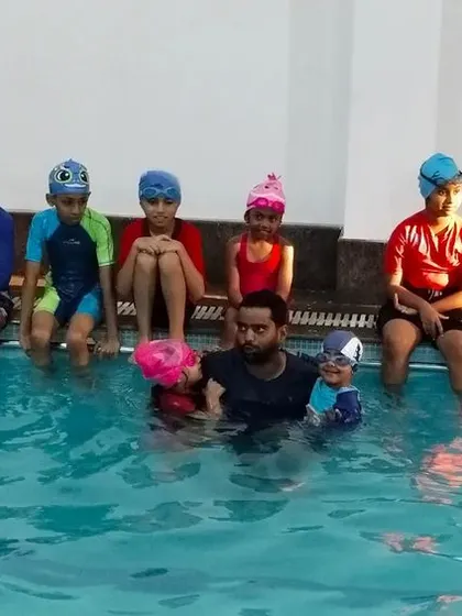 Another group shot capturing the smiles and camaraderie of our summer camp swimmers.