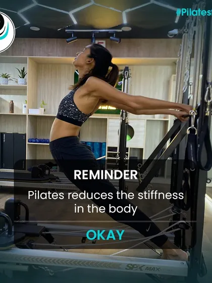 This client is performing a stretch on the Trapeze Tower, a move that reduces stiffness and improves flexibility throughout the body.