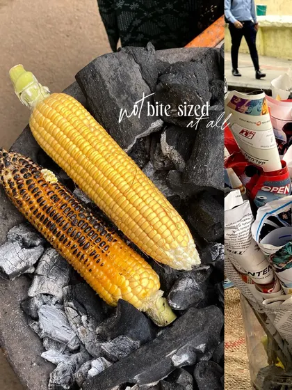 Charcoal-roasted corn, a quintessential monsoon snack found on the streets.
