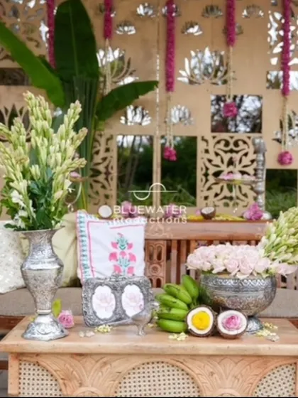 The Haldi seating area, decorated with fresh tuberoses, bananas, and other traditional elements.