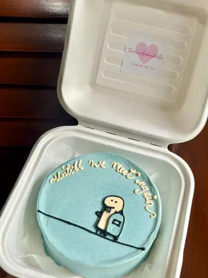 A sweet farewell bento cake with the message 'until we meet again'. It’s a thoughtful way to say goodbye to a friend who is moving away.