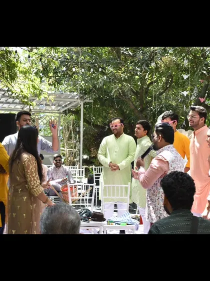 A group of guests participating in one of the interactive games I've planned for the Haldi.