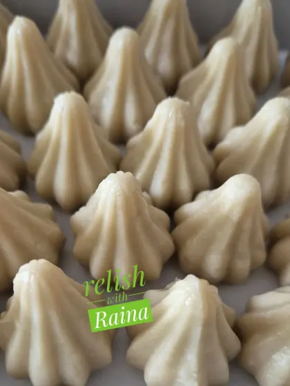 A close-up of the perfectly shaped Kaju Modaks. They are a premium and delicious offering for Bappa.