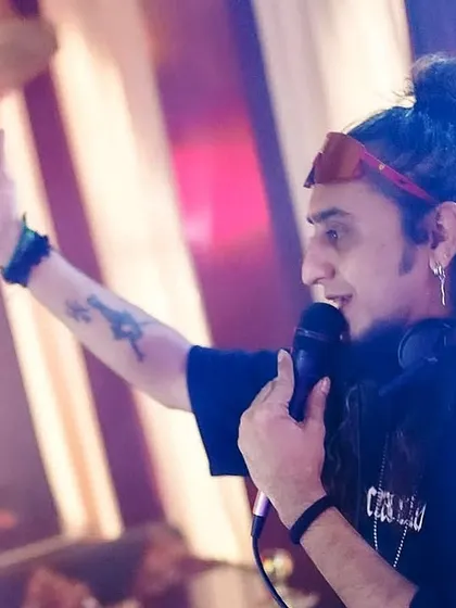 Connecting with the crowd is everything. Whether it's a club night or a private party, I'm always on the mic, engaging with the audience and pushing the vibe higher.