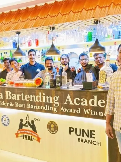 Our students and instructors after a successful molecular mixology class in Pune, surrounded by their creative concoctions.