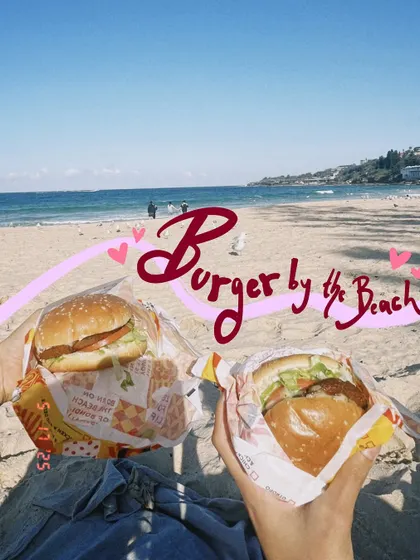Burger by the beach. A perfect combo, celebrated with some cute handwritten text and hearts.