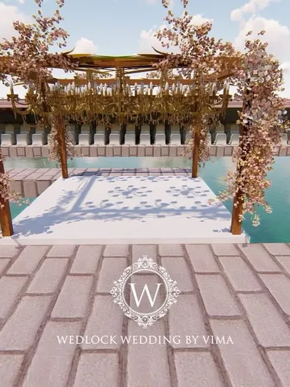 For this Punjabi wedding, we designed a subtle and elegant poolside mandap. The decor featured light fabrics, soft peachy-pink florals, and hints of gold to complement the serene setting.