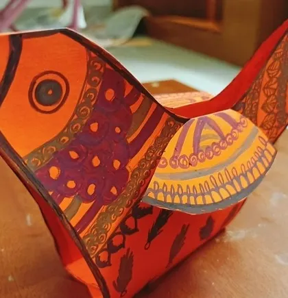 This intricate paper bird, detailed with traditional patterns, is an example of the beautiful craftwork our students produce. These monthly workshops allow them to explore form and decoration beyond the sketchbook.