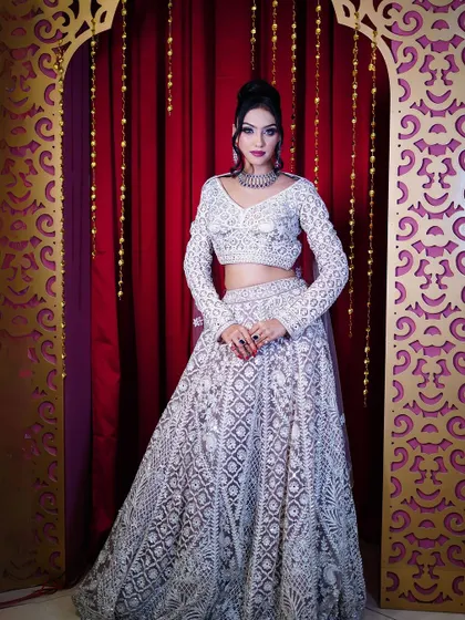 A full-length shot of the pastel lavender lehenga, perfect for a reception or engagement.