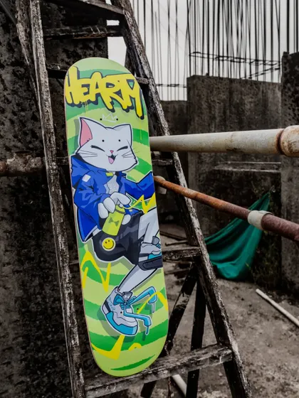 The Hearty Skateboards deck, propped up and ready to roll. I designed this to look just as good on the street as it does hanging on a wall.
