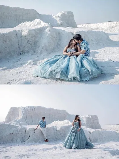 Celebrating love with our happy clients on their pre-wedding shoot. She looks like a dream in our dusty blue ball gown against the stunning white landscape.