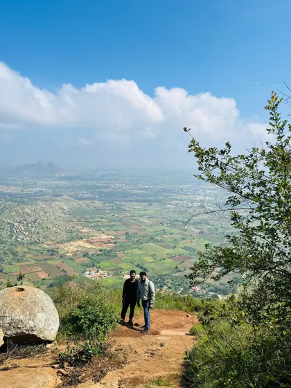 Two friends enjoying the expansive view from a hilltop. My treks offer plenty of spots for quiet contemplation.