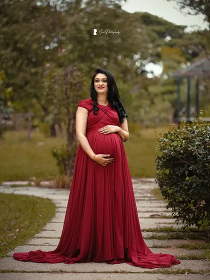 A serene portrait from a maternity shoot. I styled her hair in soft waves and used natural makeup tones to create a timeless and beautiful look.