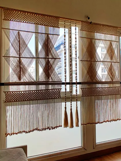 The partition seen against a frosted window, highlighting the clean lines of the geometric pattern.