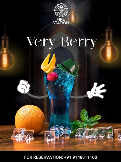 Our "Very Berry" cocktail, a vibrant blue drink with an orange and cherry garnish, presented with a fun, animated character.