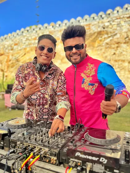 With the DJ at a Makar Sankranti themed wedding carnival. We work together to keep the energy high and the music flowing.