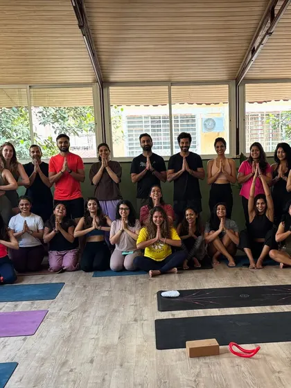 Gratitude for our growing tribe. A beautiful moment captured with our community after a fulfilling group yoga session, all centered and connected.