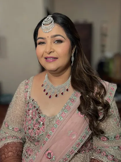 A close-up portrait of the bride, showcasing her soft glam makeup.