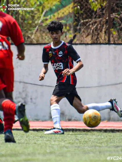 A player on the ball during the Youth Championship 2024, looking to make a decisive move.