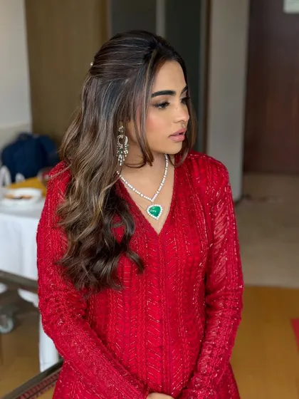 A side profile showing the beautiful waves and highlights in her hair.