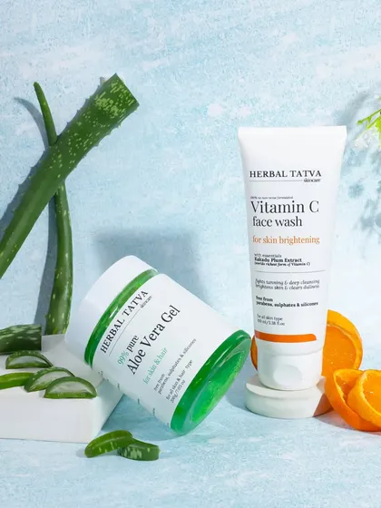 This creative shot for a Vitamin C face wash and Aloe Vera gel uses podiums and fresh ingredients. The light blue background gives it a fresh, clinical, and trustworthy feel.