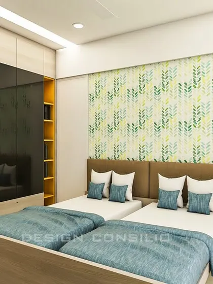 A bedroom designed for siblings, featuring two single beds and a large wardrobe with black glass shutters. The green botanical wallpaper adds a fresh and lively touch to the room.