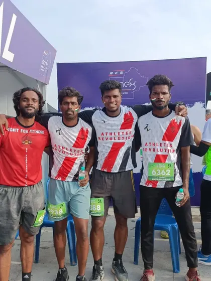 After the race with fellow athletes. The camaraderie extends beyond just our own team.