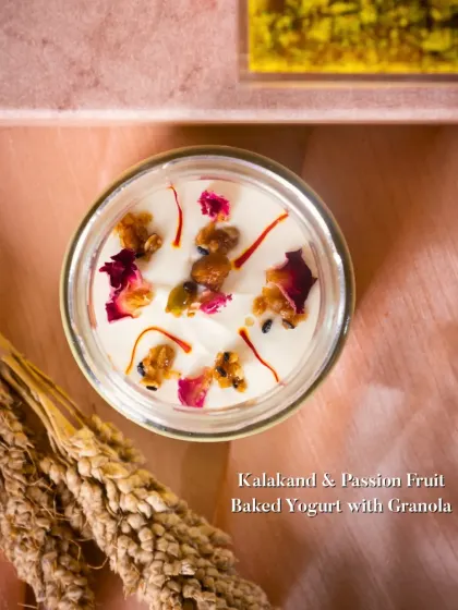 Kalakand & Passion Fruit Baked Yogurt with Granola. A fusion dessert that combines a traditional Indian sweet with tropical fruit and crunchy granola.