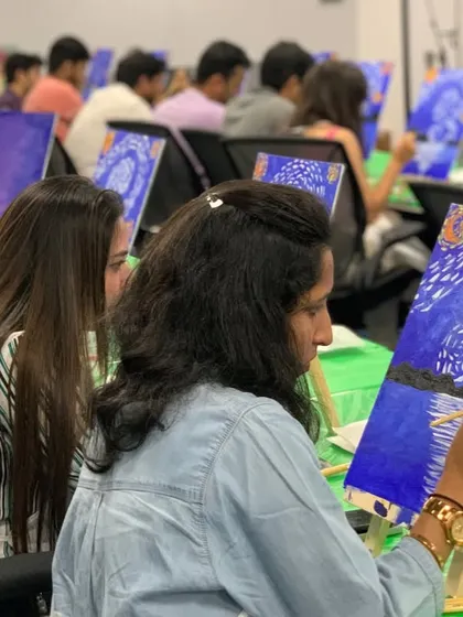 A side view of the LinkedIn team deep in their painting process. It's amazing to watch a team get into the creative flow together.