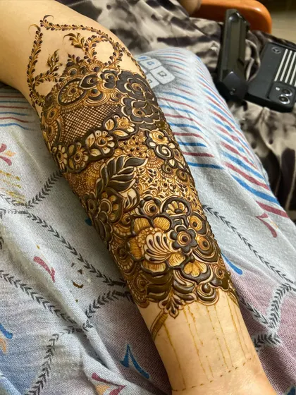This is a detailed view of my intricate bridal henna work. Each design is unique, combining traditional patterns like paisleys and mandalas with fine-line fillers to create a stunning, full-coverage look for your special day.