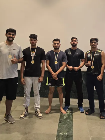 Our team of champions. Five of our students pose with their gold medals after a clean sweep at the district championship.