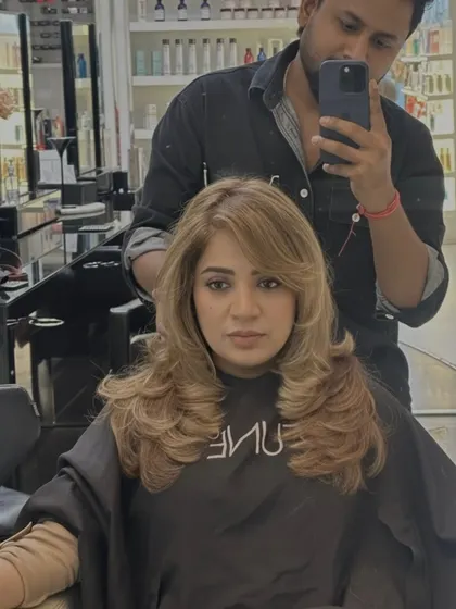 Face-framing layers and a beautiful blonde color are a perfect match. This look lifts her features and adds so much brightness.