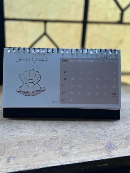 A "Spe-shell" doodle for the July page of my 2023 calendar.