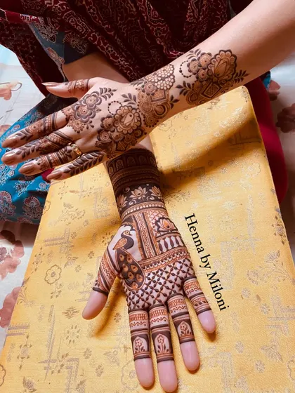 Another angle of this beautiful Teej mehendi. The combination of floral and traditional motifs is perfect for any festive celebration.