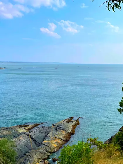 The clear blue waters and rocky shores of Gokarna, one of the beautiful views from our beach trek.