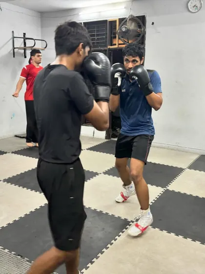 Two students drilling their jab and defense. Partner drills are essential for understanding distance and timing.