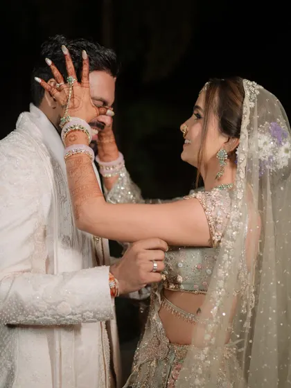 Love is playful. This candid moment between Shreya and Jash perfectly captures the friendship at the heart of their relationship, reminding us that the best love stories are full of laughter.