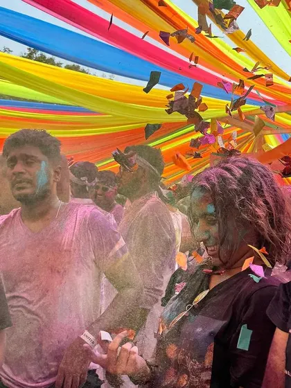 A candid shot from a Holi celebration, capturing the explosion of color and emotion. This is the feeling I aim to create with my event art: immersive, joyful, and a little bit wild.