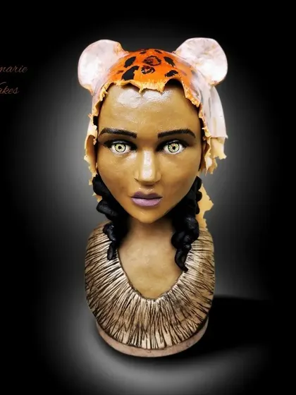 This fully edible bust was a huge learning experience for me. I sculpted the face and features from chocolate, creating a piece of art that's as delicious as it is detailed.