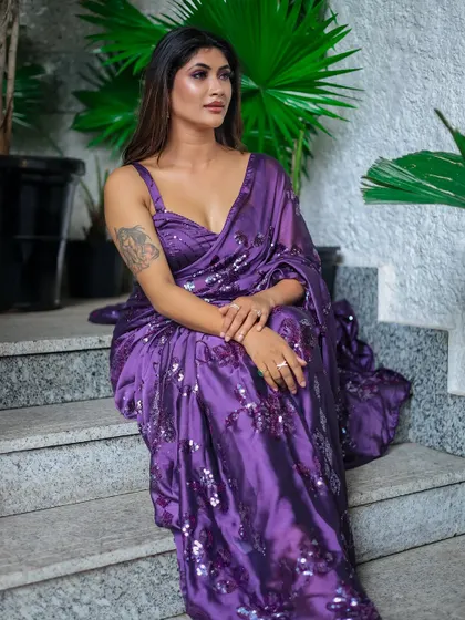 A relaxed pose from the same series, showing a different mood.