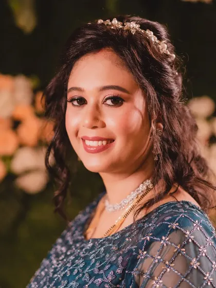 A beautiful close-up of her reception makeup. I focused on creating a luminous skin finish with a defined but soft eye and a flattering lip colour to complete her look.