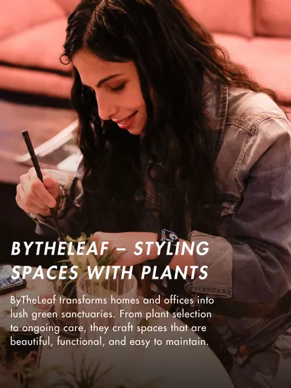 During a workshop, I guide you through every step, from selecting the right plants to styling your space. Here, a participant is focused on placing a plant, fully immersed in the creative process.