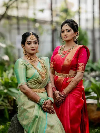 A tender moment between the couple, showcasing their beautiful coordinated outfits. Our goal is to capture the subtle emotions and details that make your wedding portraits special.