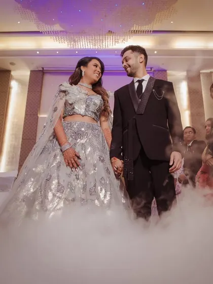 The couple's first dance on a cloud. I use special effects like dry ice to create a dreamy, romantic atmosphere for the reception, making their first dance as a married couple truly magical.