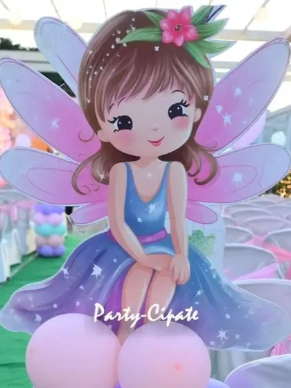 A cute fairy cutout used as an aisle marker. These character props guide guests through the space and add to the immersive, thematic experience.