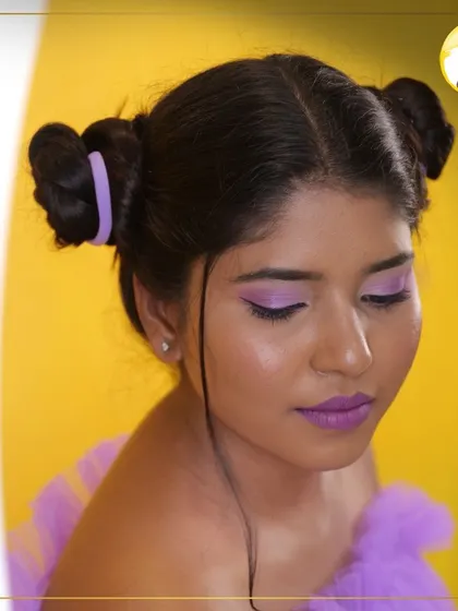 A closer view of the purple winged eyeshadow. I focus on teaching sharp lines and even color application to achieve a bold, graphic eye look like this one.